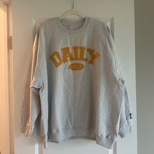 Daily drills grey and orange print sweatshirt xs/s nwot
